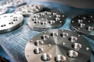 Close-up chrome metal circles with holes