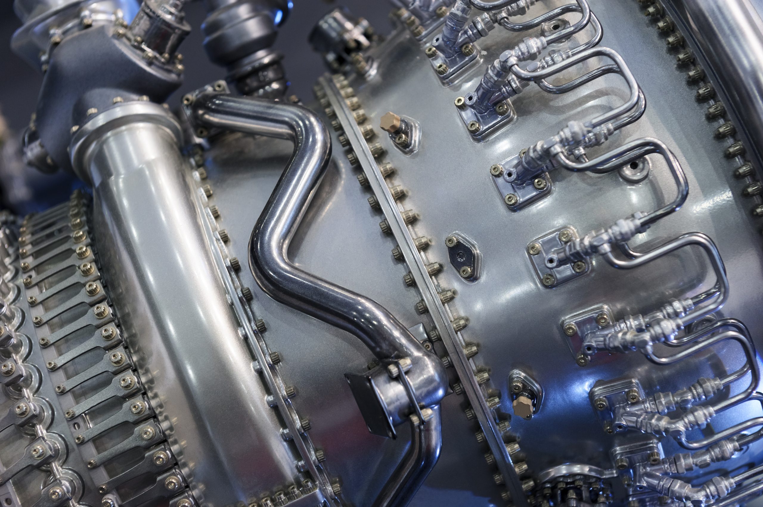 Engine of fighter jet with bent tubing